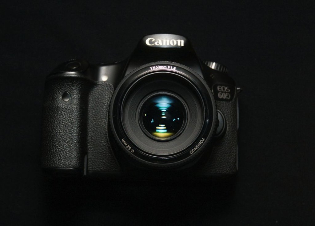 black Canon brand digital camera 